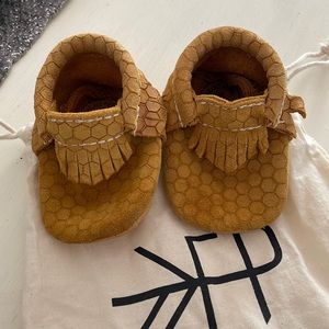 Freshly picked baby shoes